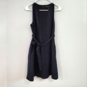 Banana Republic Black eyelet shift dress with tie belt.